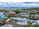 Aerial view of waterfront community showing homes and canals at 744 Jungle Queen Way, Longboat Key, FL 34228