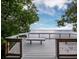 Relaxing waterfront deck overlooking a tranquil bay at 744 Jungle Queen Way, Longboat Key, FL 34228