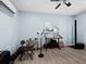 Bright bedroom with hardwood floors and window coverings at 744 Jungle Queen Way, Longboat Key, FL 34228
