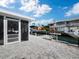 Backyard patio with canal access and boat slips at 744 Jungle Queen Way, Longboat Key, FL 34228