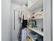 Well-organized closet with shelves and hanging space at 744 Jungle Queen Way, Longboat Key, FL 34228