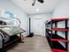Home office with built-in shelving and large work table at 744 Jungle Queen Way, Longboat Key, FL 34228