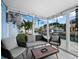 Relaxing screened porch overlooking the canal at 744 Jungle Queen Way, Longboat Key, FL 34228