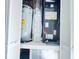 Utility closet with water heater and HVAC unit at 7711 N Orleans Ave, Tampa, FL 33604