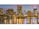Modern city skyline at night with reflections in the water at 199 Dali Blvd # 302, St Petersburg, FL 33701