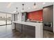 Clubhouse kitchen with bar seating, appliances, and modern finishes at 199 Dali Blvd # 302, St Petersburg, FL 33701