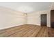 Dining area with modern light fixture and wood-style flooring at 199 Dali Blvd # 302, St Petersburg, FL 33701