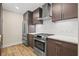 Modern kitchen with stainless steel appliances and white countertops at 199 Dali Blvd # 302, St Petersburg, FL 33701