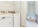 Laundry room with Maytag washer and dryer at 2606 Espana Ct, Tampa, FL 33609