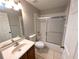 Bathroom featuring a shower, toilet, and vanity at 27355 Breakers Dr, Wesley Chapel, FL 33544