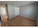 Spacious bedroom with closet and hardwood floors at 27355 Breakers Dr, Wesley Chapel, FL 33544