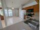 Kitchen with wood cabinets, stainless steel appliances, and tile floor at 27355 Breakers Dr, Wesley Chapel, FL 33544