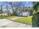 Lovely home with attached garage and ample front and side yard at 3602 W Dale Ave, Tampa, FL 33609