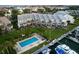 Birds-eye view of the community with pool and boat slips at 370 Pinellas Bayway S # E, Tierra Verde, FL 33715