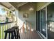 Balcony with a bar top, seating and views of the community at 370 Pinellas Bayway S # E, Tierra Verde, FL 33715