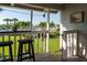 Relaxing balcony with marina views and bar seating at 370 Pinellas Bayway S # E, Tierra Verde, FL 33715