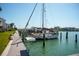 Private dock with sailboat and access to open water at 370 Pinellas Bayway S # E, Tierra Verde, FL 33715