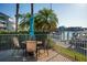 Relaxing patio with waterfront views perfect for outdoor dining and entertaining at 370 Pinellas Bayway S # E, Tierra Verde, FL 33715