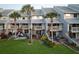 Charming townhouses with balconies, spiral staircases, and lush landscaping at 370 Pinellas Bayway S # E, Tierra Verde, FL 33715