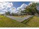 Charming ranch home with white picket fence and mature landscaping at 3700 27Th N Ave, St Petersburg, FL 33713