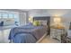 Main bedroom with water view and ensuite access at 4775 Cove Cir # 904, St Petersburg, FL 33708