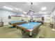 Community billiard room with multiple tables at 4775 Cove Cir # 904, St Petersburg, FL 33708