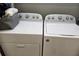 Full-size Whirlpool washer and dryer in a dedicated laundry area at 4775 Cove Cir # 904, St Petersburg, FL 33708