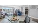 Living room features a comfortable sectional sofa and city views at 4775 Cove Cir # 904, St Petersburg, FL 33708