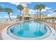 Large kidney-shaped pool with a view at 4775 Cove Cir # 904, St Petersburg, FL 33708