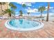 Relaxing waterfront pool with steps at 4775 Cove Cir # 904, St Petersburg, FL 33708