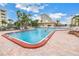 Inviting community pool with ample deck space at 4775 Cove Cir # 904, St Petersburg, FL 33708