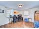 Functional bedroom with a work area and natural light at 5624 Mccoy Ct, Zephyrhills, FL 33542