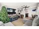 View of the living room, Christmas tree, and glimpse into the kitchen at 9184 86Th St, Seminole, FL 33777