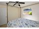 Bedroom features tile floors, canopy bed and window at 9567 85Th St, Seminole, FL 33777
