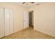 Bright bedroom featuring closet, neutral walls, ceiling fan and tile floors at 9567 85Th St, Seminole, FL 33777