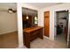 Kitchen featuring a breakfast bar, connecting seamlessly to the living area, enhancing the home's open layout at 9567 85Th St, Seminole, FL 33777