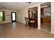 Spacious open-concept living room connected to the kitchen, highlighted by tile flooring and ample light at 9567 85Th St, Seminole, FL 33777