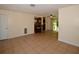 Open living area with tile flooring, seamlessly connecting to the kitchen and outdoor space at 9567 85Th St, Seminole, FL 33777