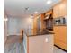 Modern kitchen with stainless steel appliances, granite countertops, and wood cabinets at 1120 E Kennedy Blvd # 927, Tampa, FL 33602