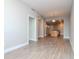 Spacious living room with open concept layout, wood-style flooring, and recessed lighting at 1120 E Kennedy Blvd # 927, Tampa, FL 33602