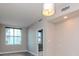 Bright living room with large windows and a sliding door at 1120 E Kennedy Blvd # 927, Tampa, FL 33602