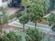 Shuffleboard court surrounded by palm trees and benches at 1120 E Kennedy Blvd # 927, Tampa, FL 33602