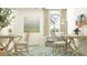 Home office with two desks, comfortable seating, and stylish decor at 12430 Sweet Angel Aura Way, Parrish, FL 34219