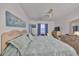 Primary bedroom with large bed and plenty of dresser space at 1901 Canterbury Ln # 19, Sun City Center, FL 33573