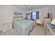 Comfortable bedroom with ceiling fan and dresser at 1901 Canterbury Ln # 19, Sun City Center, FL 33573