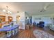 Cozy dining area with a round table and wooden hutch at 1901 Canterbury Ln # 19, Sun City Center, FL 33573