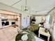 Open floor plan showcasing the kitchen and living area with comfortable seating at 2403 Finlandia Ln # 57, Clearwater, FL 33763