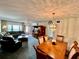 Open-concept living space combining the living and dining areas with abundant natural light at 2403 Finlandia Ln # 57, Clearwater, FL 33763