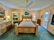 A traditional main bedroom featuring light wood furniture and neutral decor at 2403 Finlandia Ln # 57, Clearwater, FL 33763
