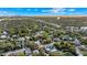 High angle view of a neighborhood with houses, trees, and a pool at 306 E Paris St, Tampa, FL 33604